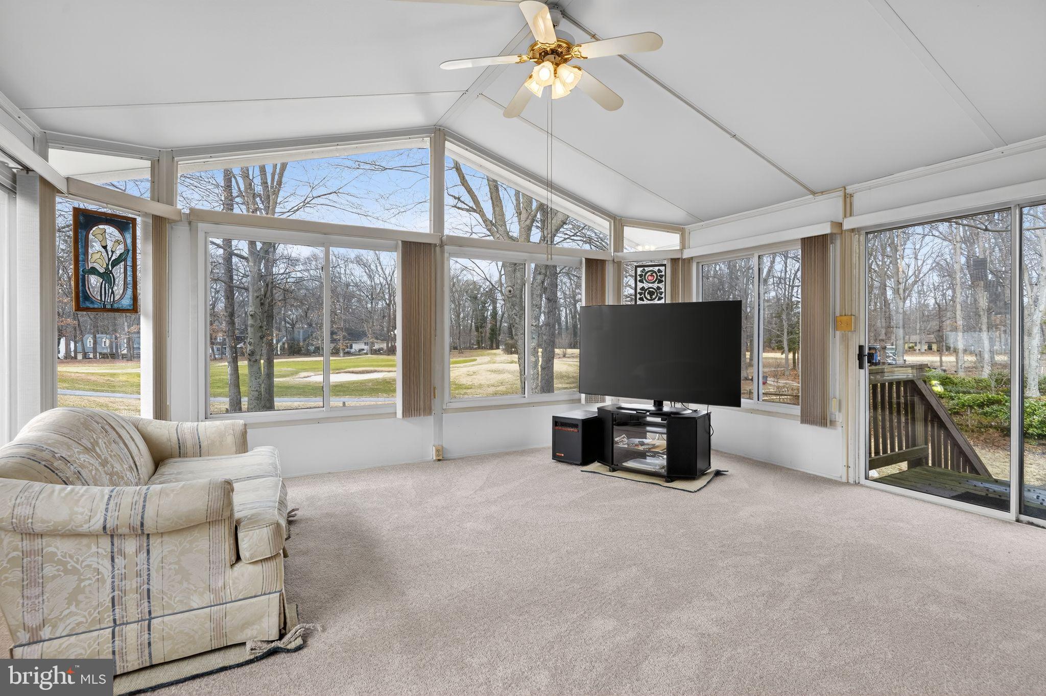 1629 Eton Way Crofton, MD 21114 - Photo 11 of 46 a living room with furniture and a flat screen tv