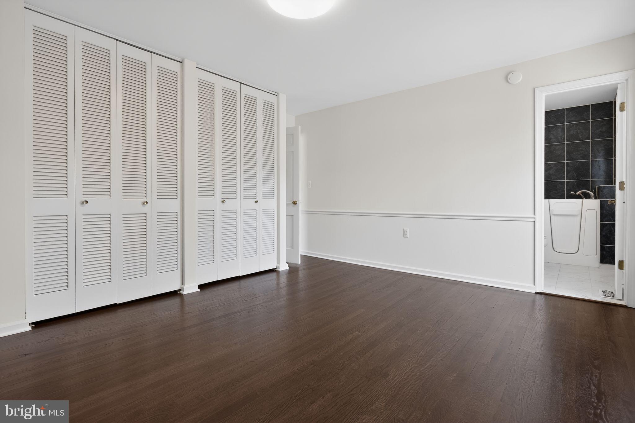 1629 Eton Way Crofton, MD 21114 - Photo 20 of 46 a view of a livingroom with wooden floor