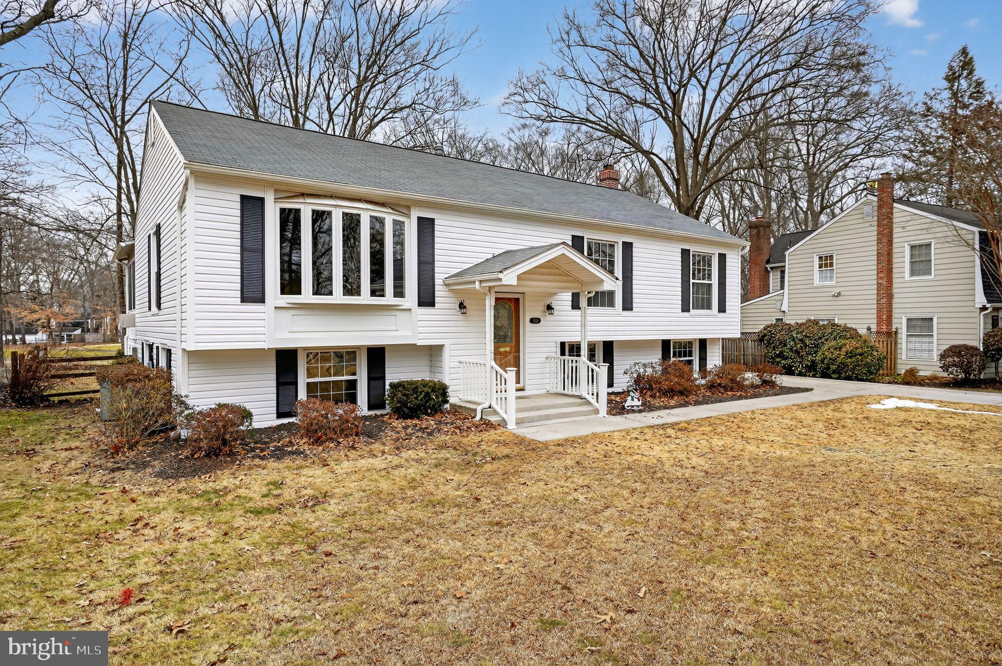 1629 Eton Way Crofton, MD 21114 - Photo 2 of 46 a view of a house with a yard covered in snow
