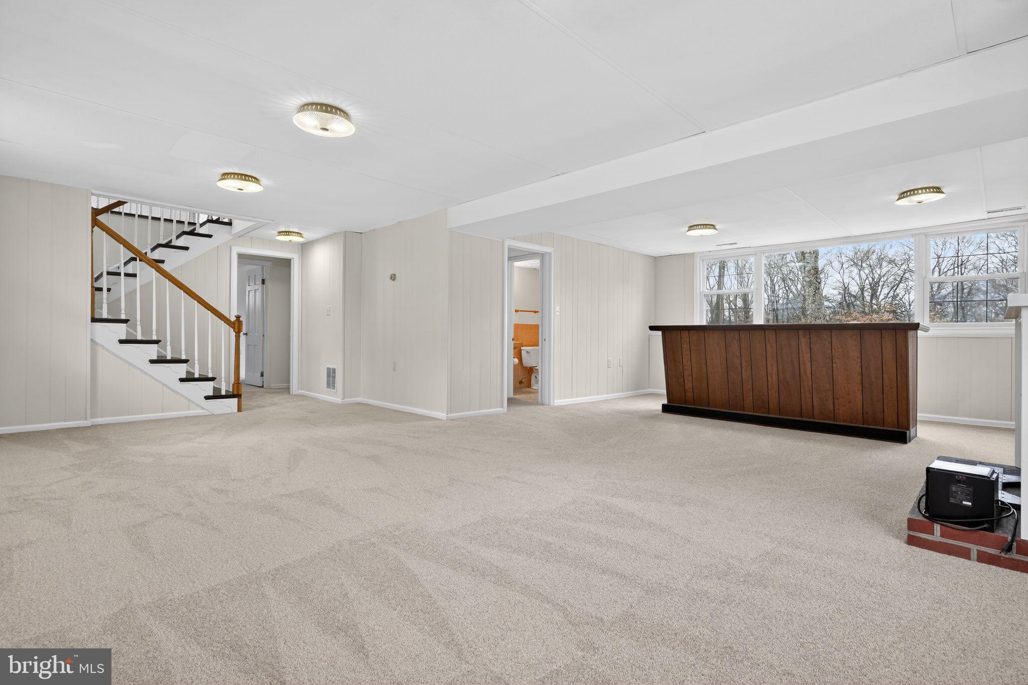 1629 Eton Way Crofton, MD 21114 - Photo 27 of 46 a view of an empty room with stairs
