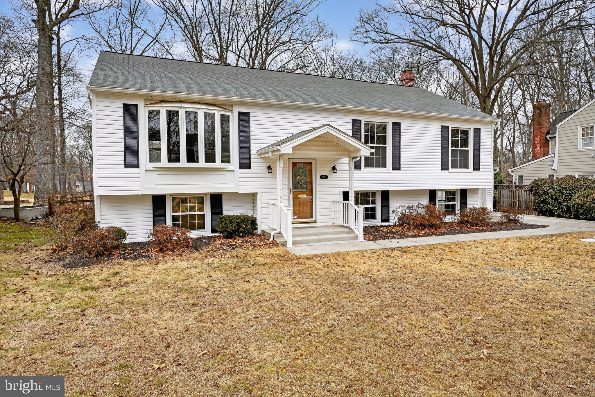 1629 Eton Way Crofton, MD 21114 - Photo 3 of 46 a front view of a house with a yard