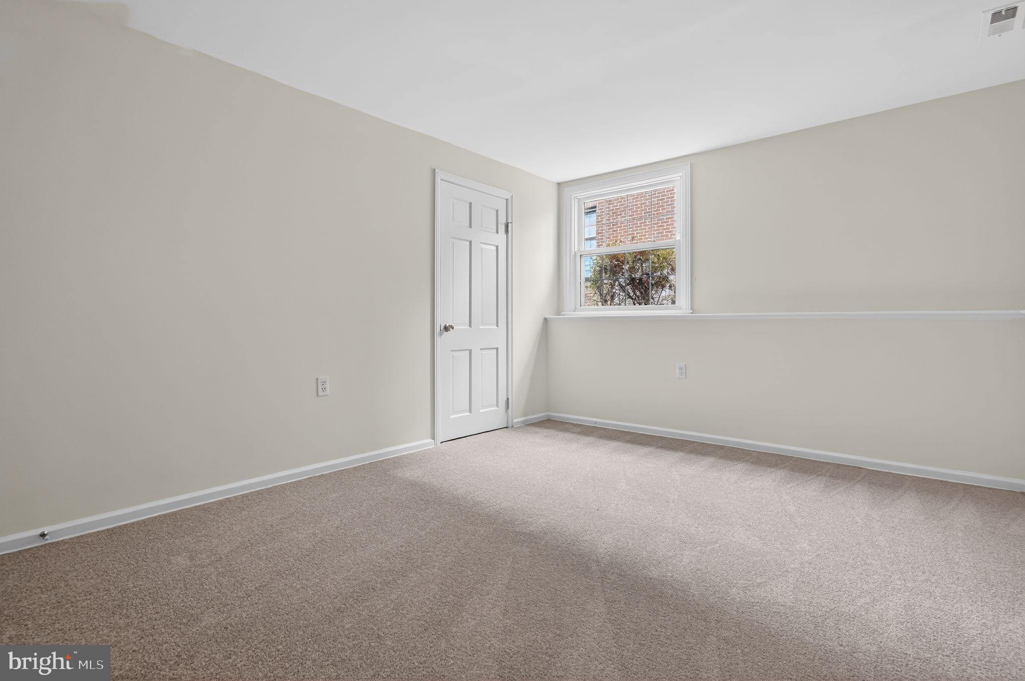 1629 Eton Way Crofton, MD 21114 - Photo 32 of 46 an empty room with windows
