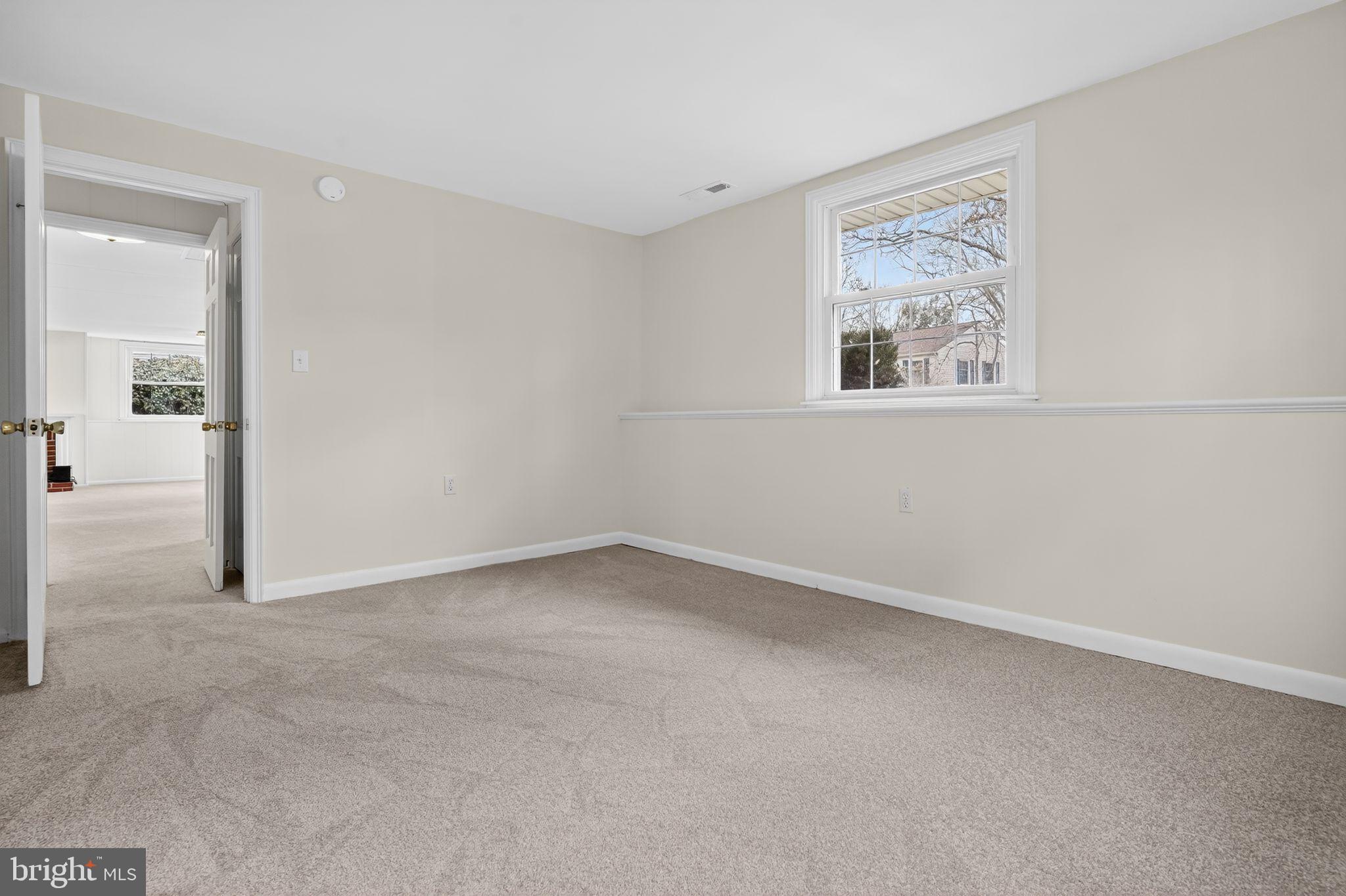 1629 Eton Way Crofton, MD 21114 - Photo 34 of 46 an empty room with a window
