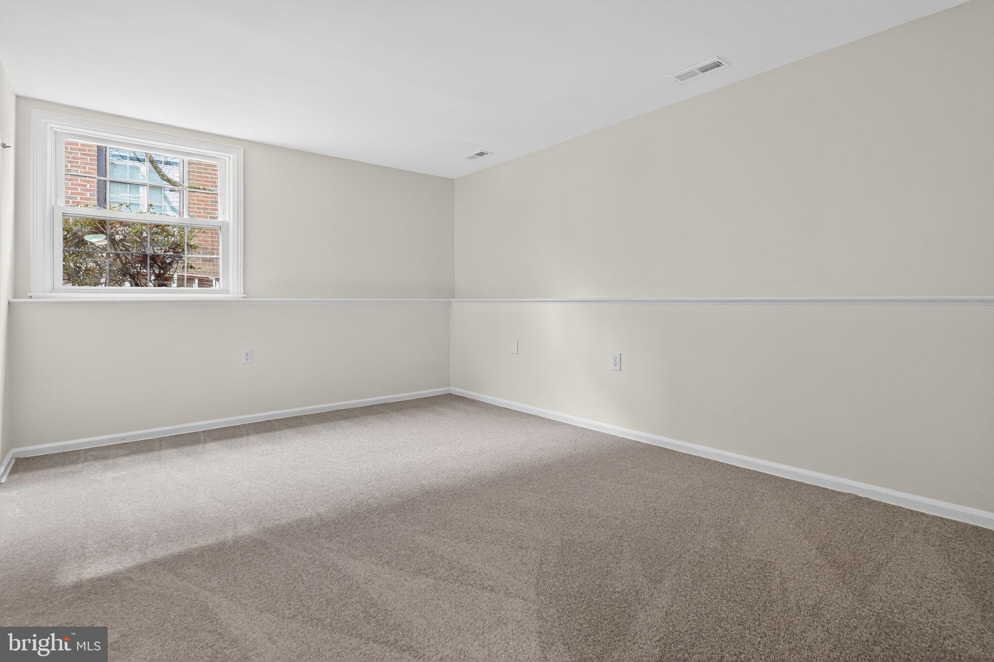 1629 Eton Way Crofton, MD 21114 - Photo 35 of 46 a view of an empty room with a window