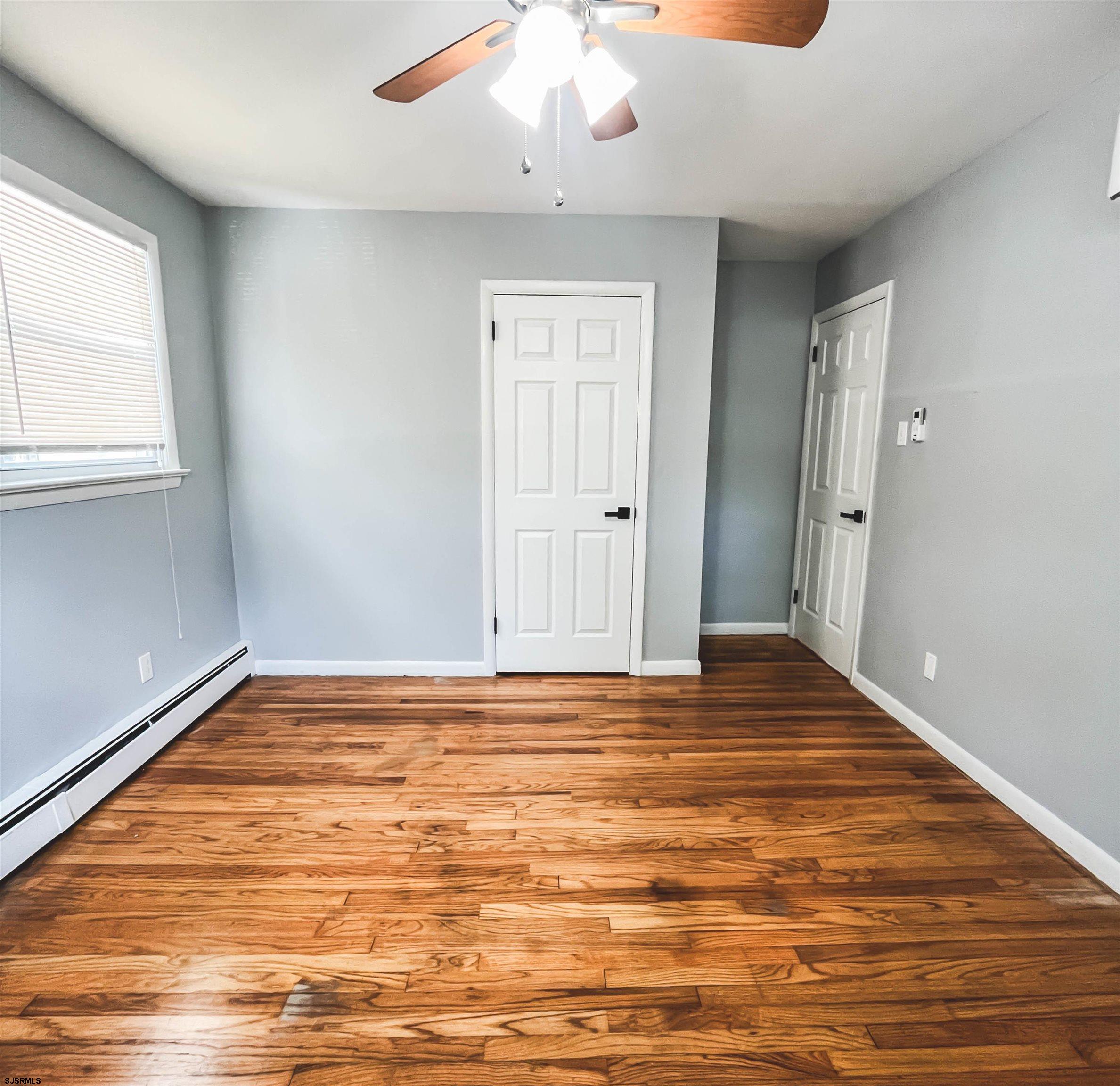 518 Delaware Avenue Absecon, NJ 08201 - Photo 15 of 38 a view of a room with wooden floor and natural light