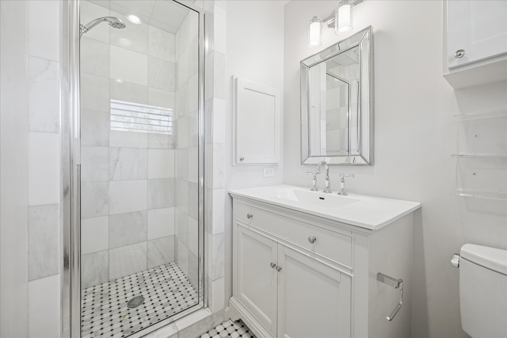547 3 Corners Drive Hunters Creek Village, TX 77024 - Photo 10 of 17 a bathroom with a sink a toilet and shower
