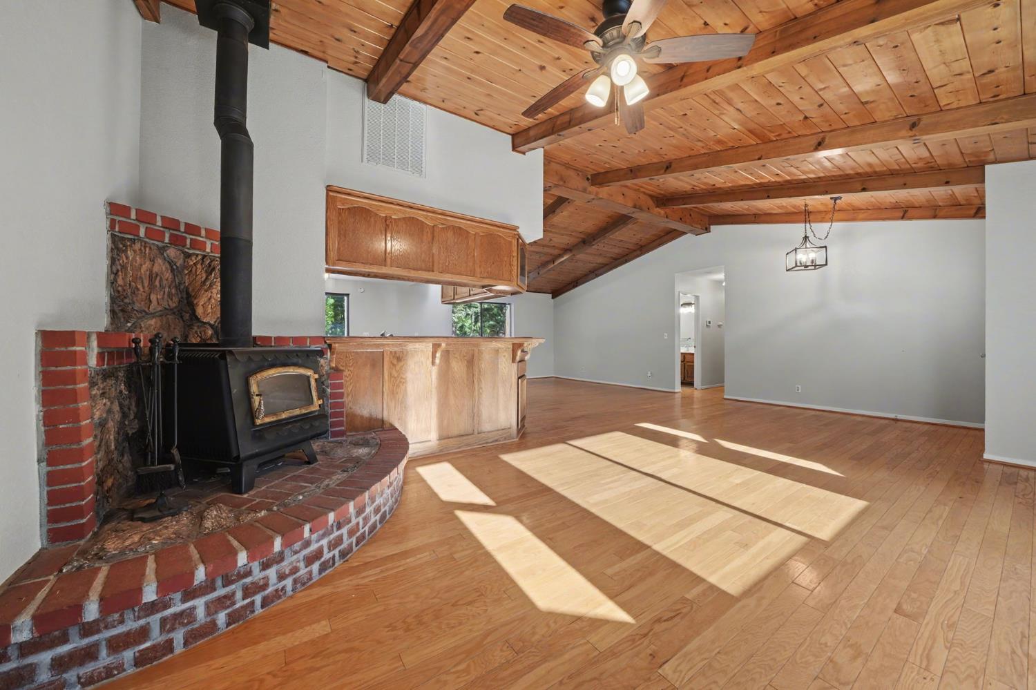 23781 Golden Ridge Drive Volcano, CA 95689 - Photo 12 of 50 a living room with a bed and a flat screen tv