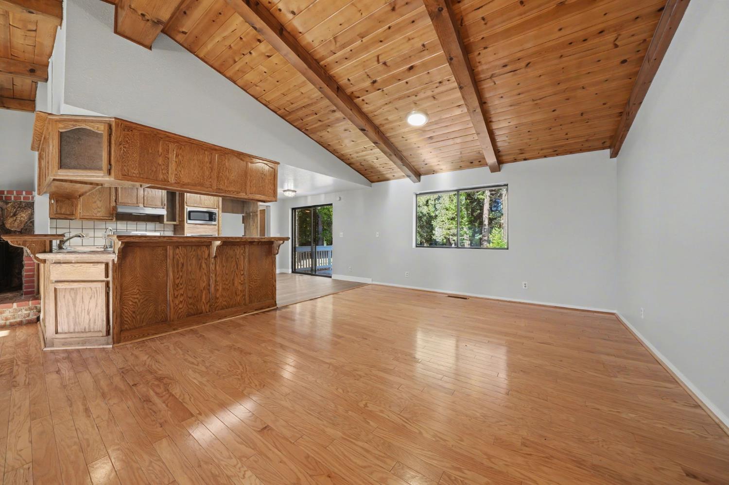 23781 Golden Ridge Drive Volcano, CA 95689 - Photo 16 of 50 a view of an empty room with a kitchen