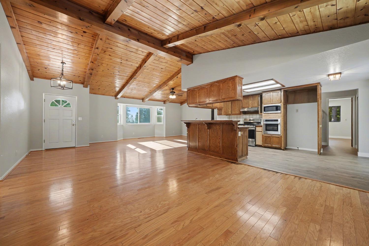 23781 Golden Ridge Drive Volcano, CA 95689 - Photo 17 of 50 a view of a livingroom with wooden floor