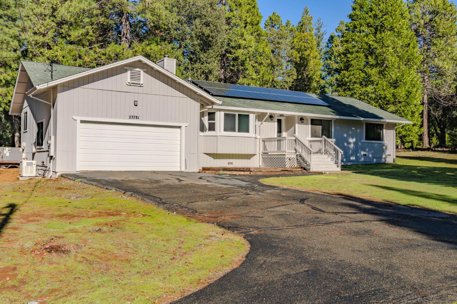 23781 Golden Ridge Drive Volcano, CA 95689 - Photo 3 of 50 a front view of house with yard and trees in the background