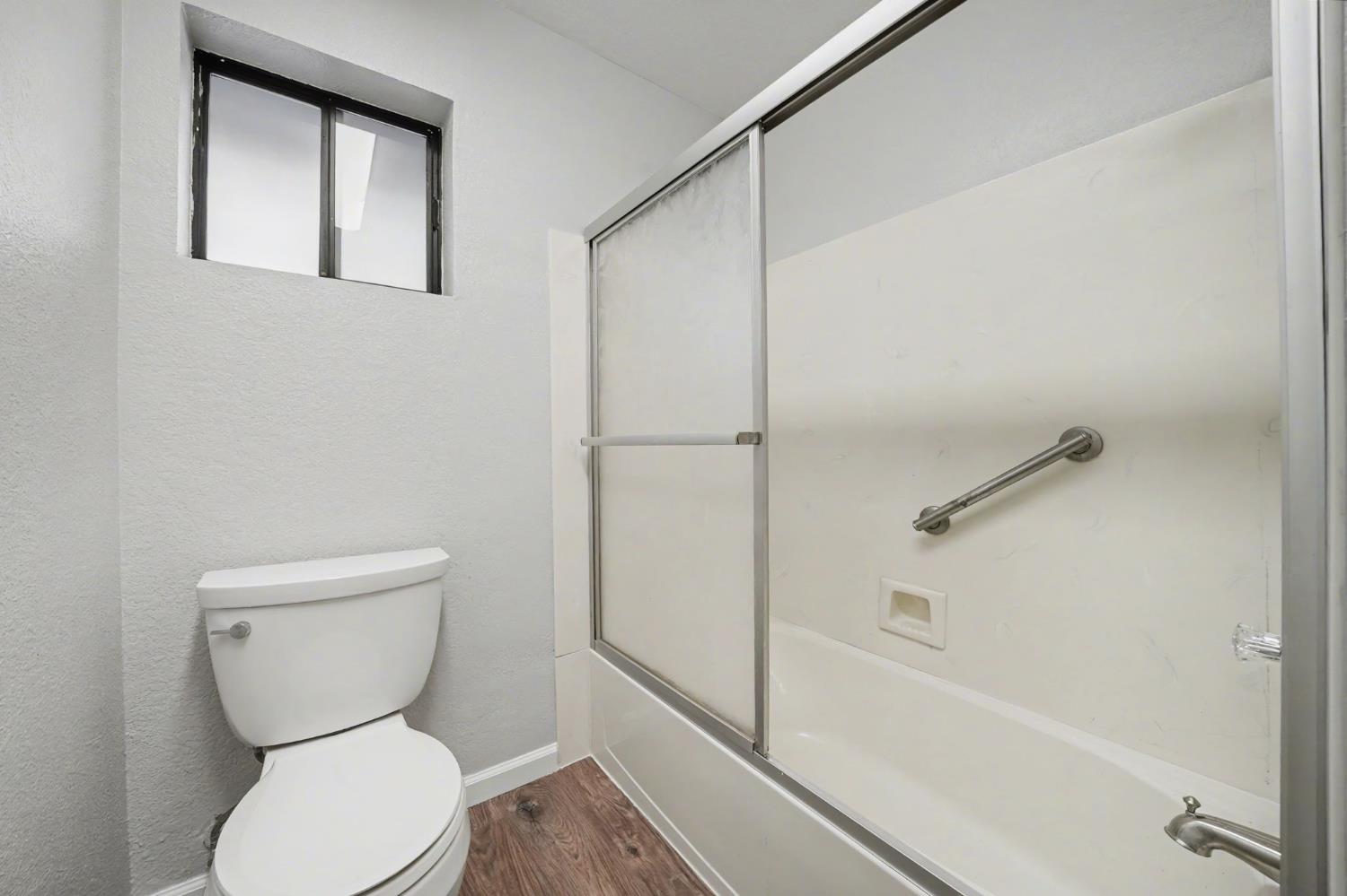 23781 Golden Ridge Drive Volcano, CA 95689 - Photo 35 of 50 a bathroom with a toilet and a shower