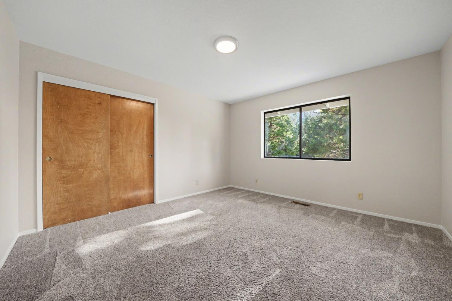 23781 Golden Ridge Drive Volcano, CA 95689 - Photo 37 of 50 a view of an empty room with a window