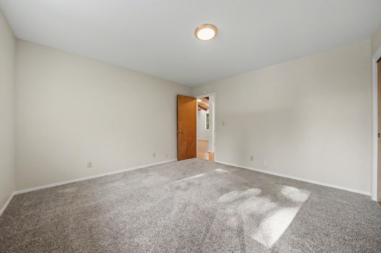 23781 Golden Ridge Drive Volcano, CA 95689 - Photo 38 of 50 a view of an empty room and window