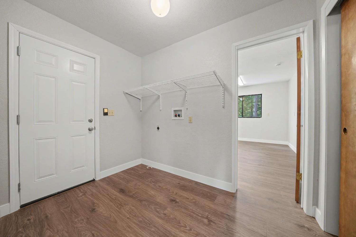 23781 Golden Ridge Drive Volcano, CA 95689 - Photo 39 of 50 wooden floor in an empty room