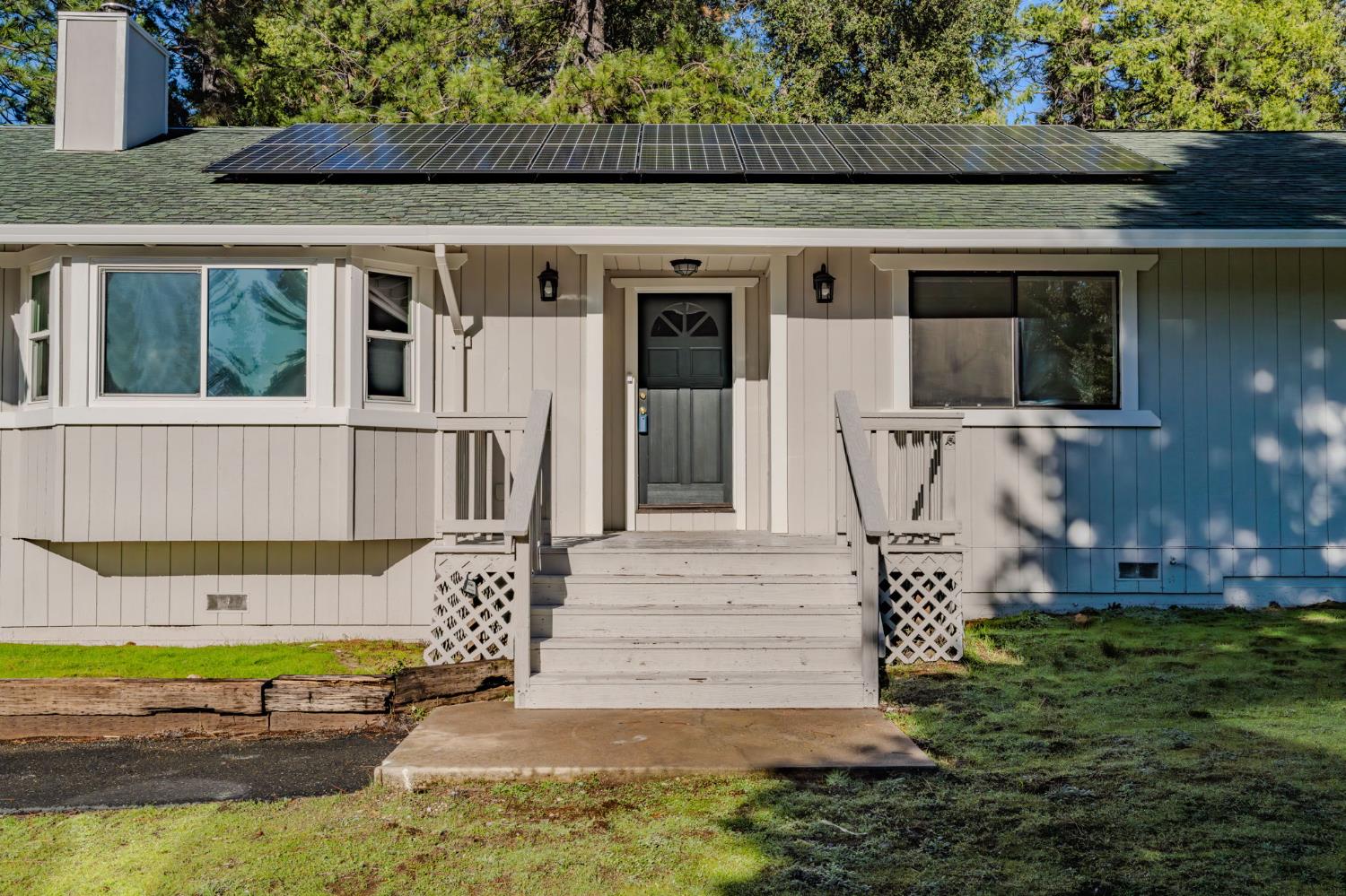 23781 Golden Ridge Drive Volcano, CA 95689 - Photo 4 of 50 a view of a house with a yard