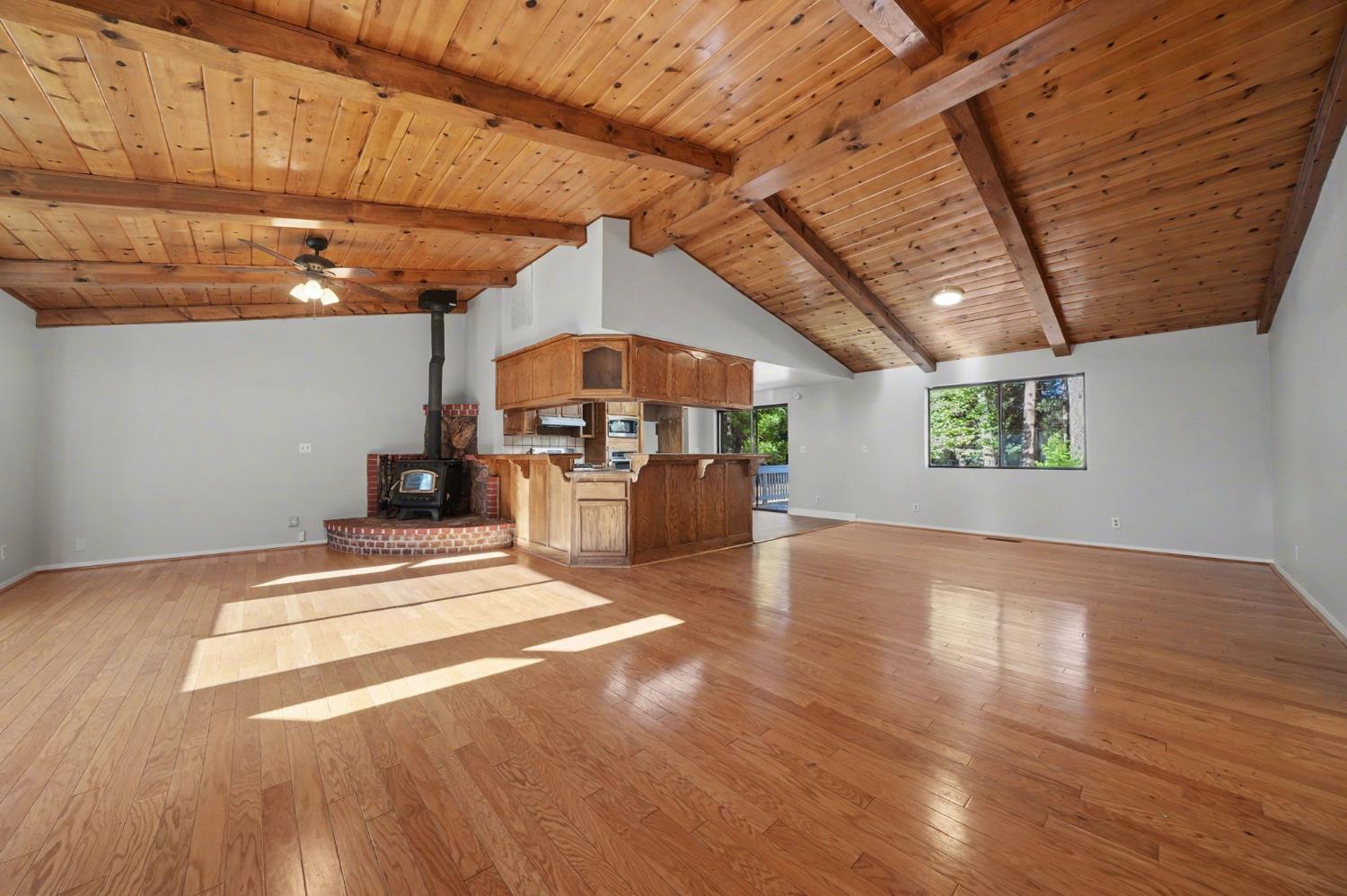 23781 Golden Ridge Drive Volcano, CA 95689 - Photo 6 of 50 a view of a room with a wooden floor
