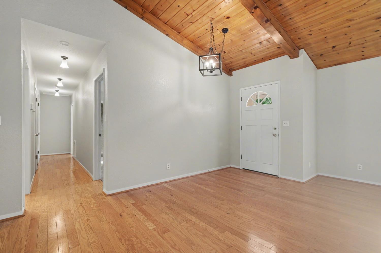 23781 Golden Ridge Drive Volcano, CA 95689 - Photo 8 of 50 a view of hallway with wooden floor