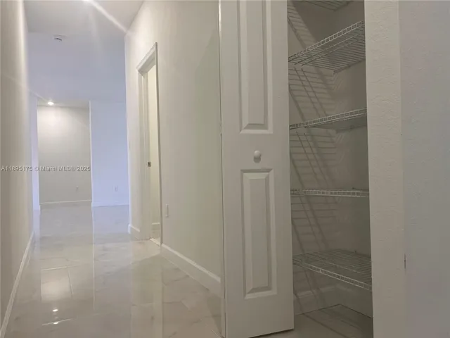 a view of a room with an empty space