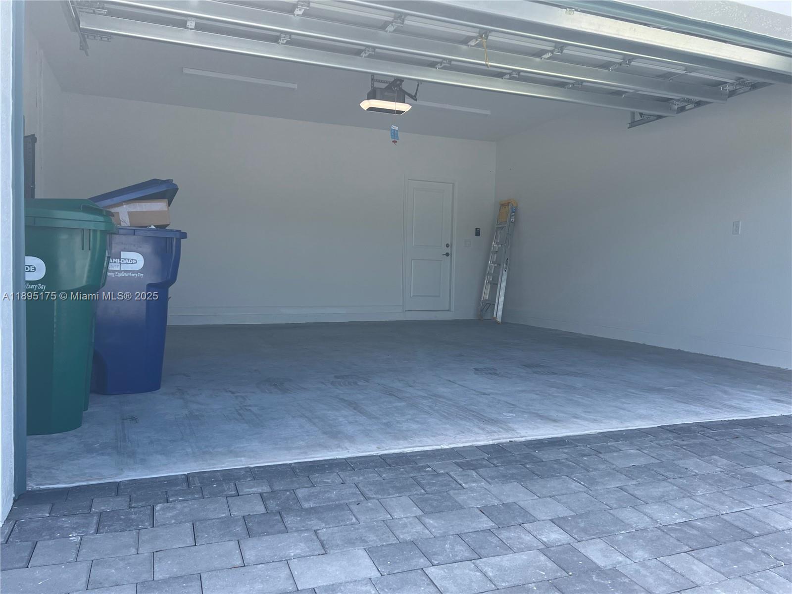 16960 Southwest 288th Terrace, Unit 16960 Homestead, FL 33033 - Photo 26 of 33 a view of a room with an empty space