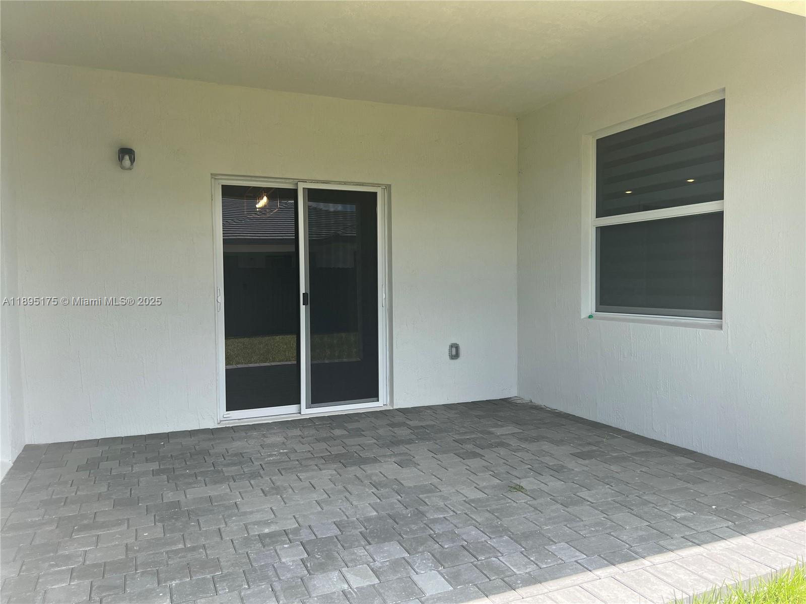 16960 Southwest 288th Terrace, Unit 16960 Homestead, FL 33033 - Photo 28 of 33 a view of an empty room