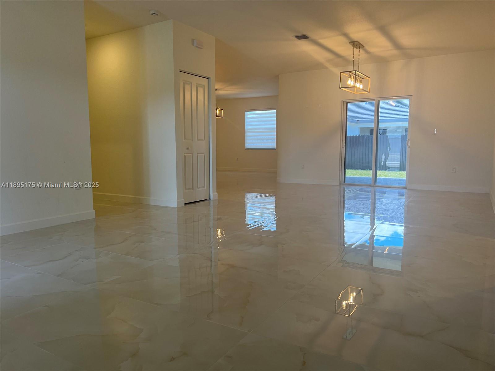 16960 Southwest 288th Terrace, Unit 16960 Homestead, FL 33033 - Photo 10 of 33 view of a bathroom with mirror