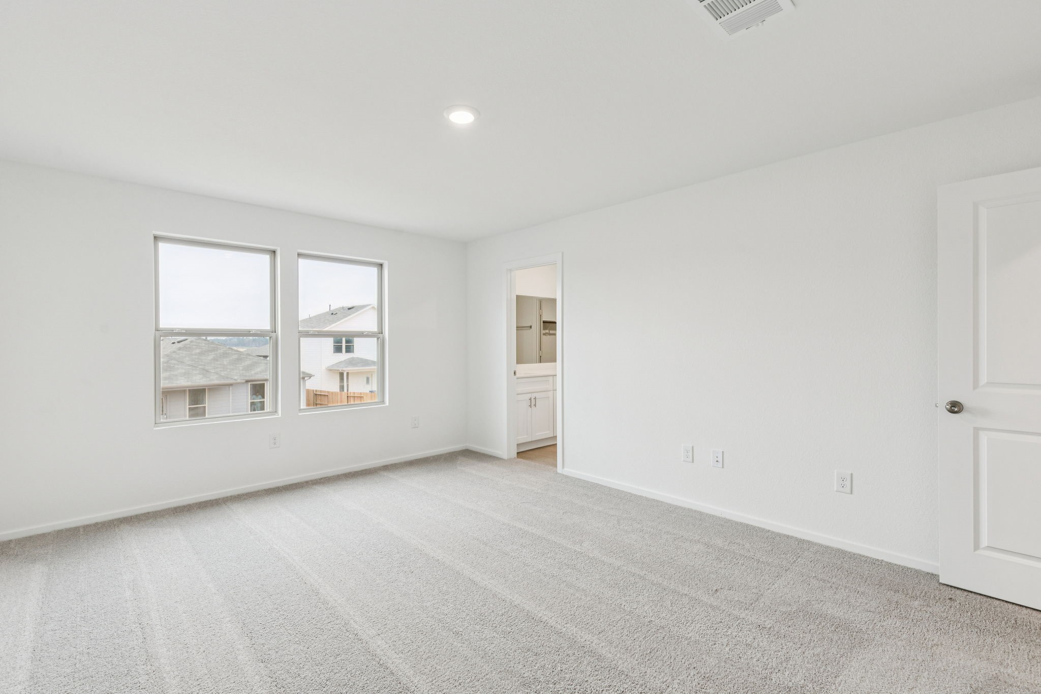 16148 Sepia Manor Street Conroe, TX 77302 - Photo 17 of 32 an empty room with windows