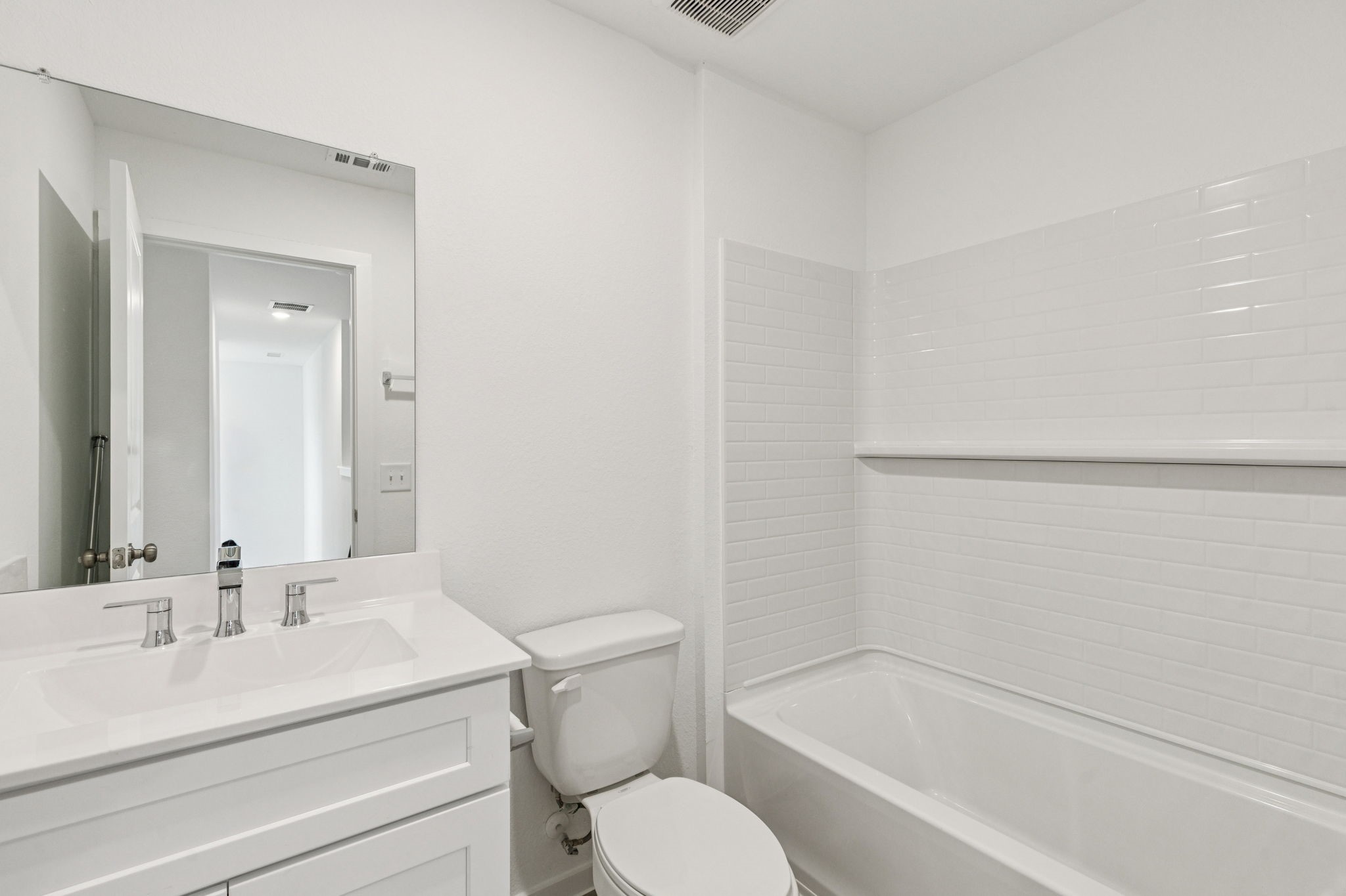 16148 Sepia Manor Street Conroe, TX 77302 - Photo 22 of 32 a bathroom with a sink toilet and bathtub
