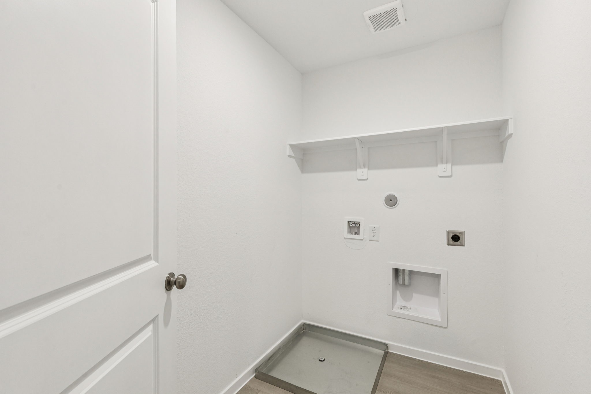 16148 Sepia Manor Street Conroe, TX 77302 - Photo 24 of 32 a view of a room with white walls