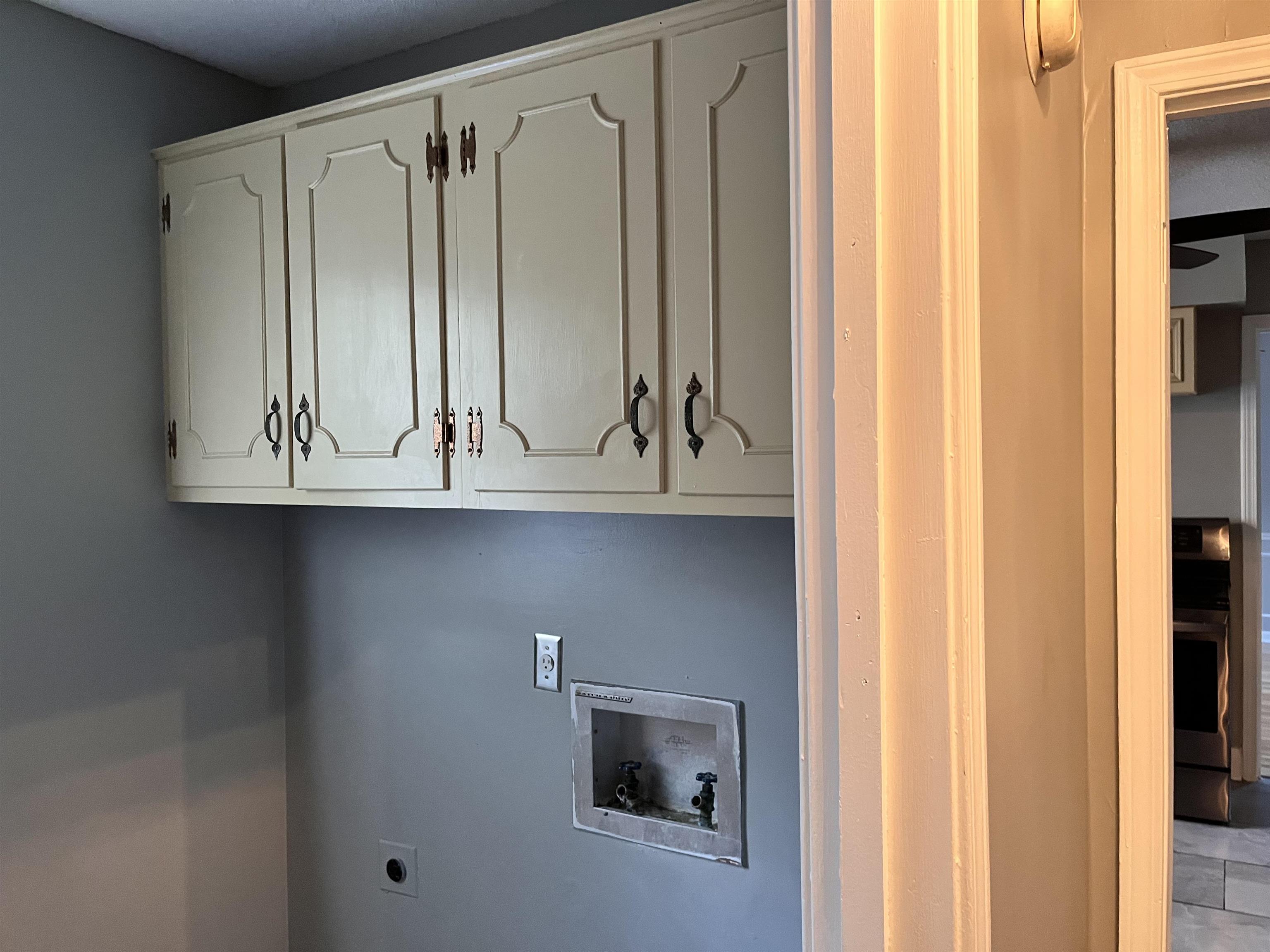 4282 Millbranch Road Memphis, TN 38116 - Photo 11 of 28 Washroom featuring cabinet space, electric dryer hookup, and hookup for a washing machine