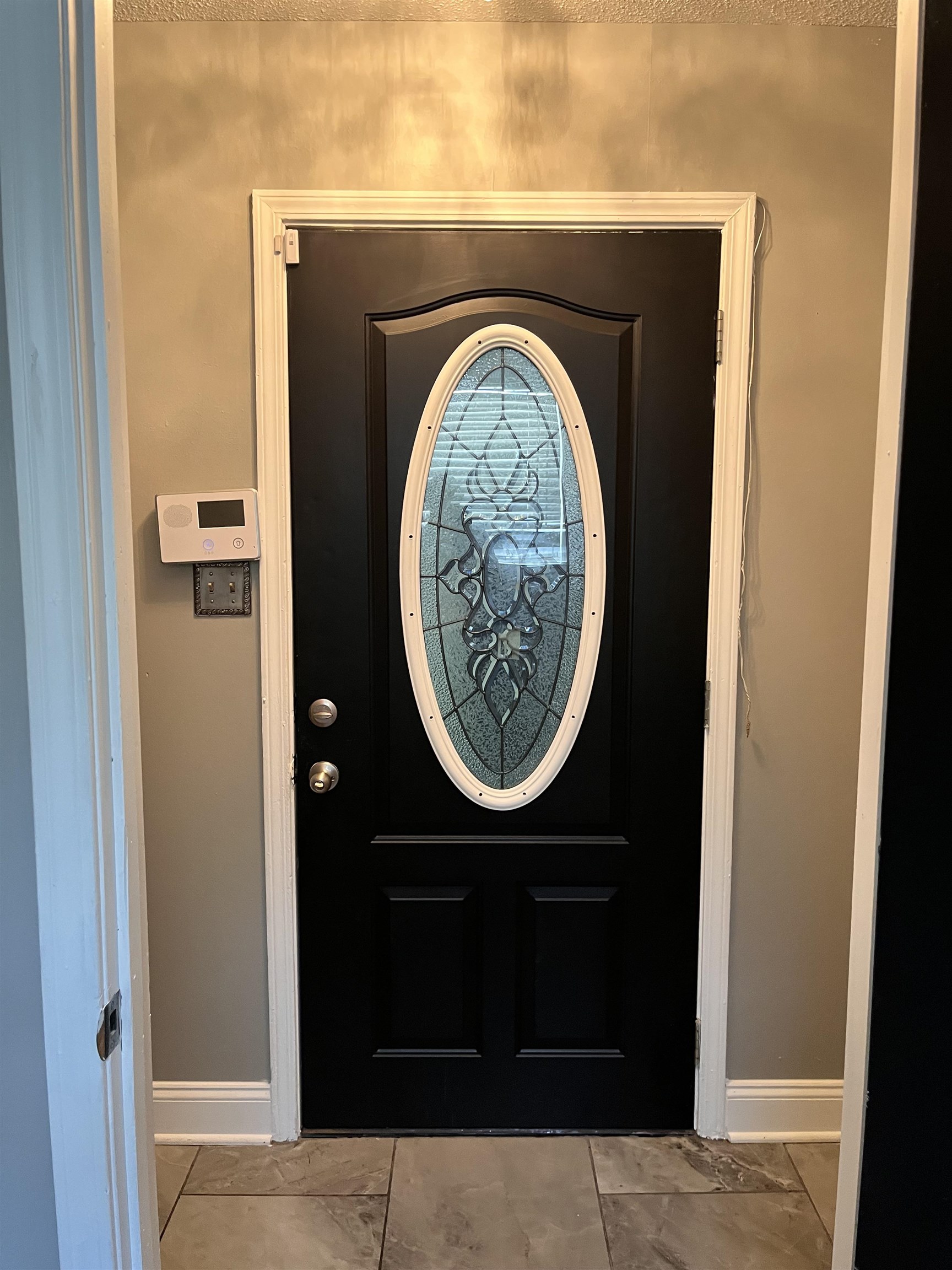 4282 Millbranch Road Memphis, TN 38116 - Photo 20 of 28 Foyer with marble look tile flooring