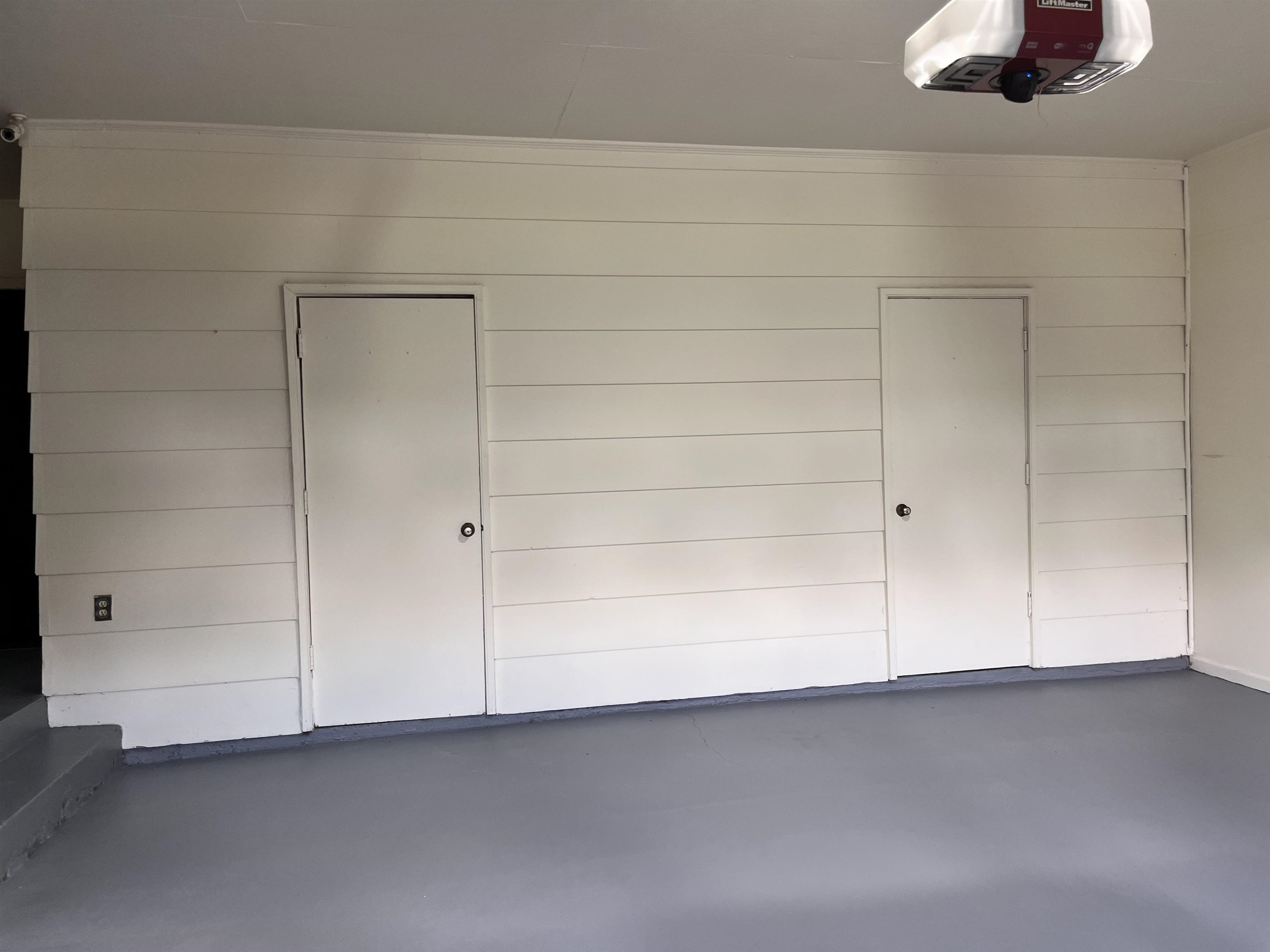 4282 Millbranch Road Memphis, TN 38116 - Photo 22 of 28 Garage with a garage door opener