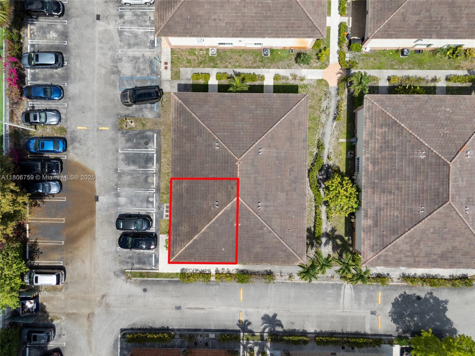 6755 Northwest 182nd Street, Unit 104 Hialeah, FL 33015 - Photo 4 of 33 an aerial view of multiple houses with a yard