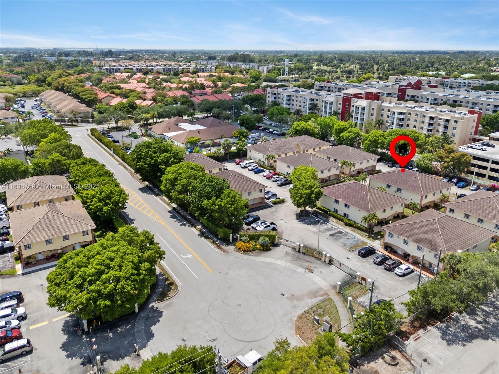 6755 Northwest 182nd Street, Unit 104 Hialeah, FL 33015 - Photo 6 of 33 an aerial view of a city