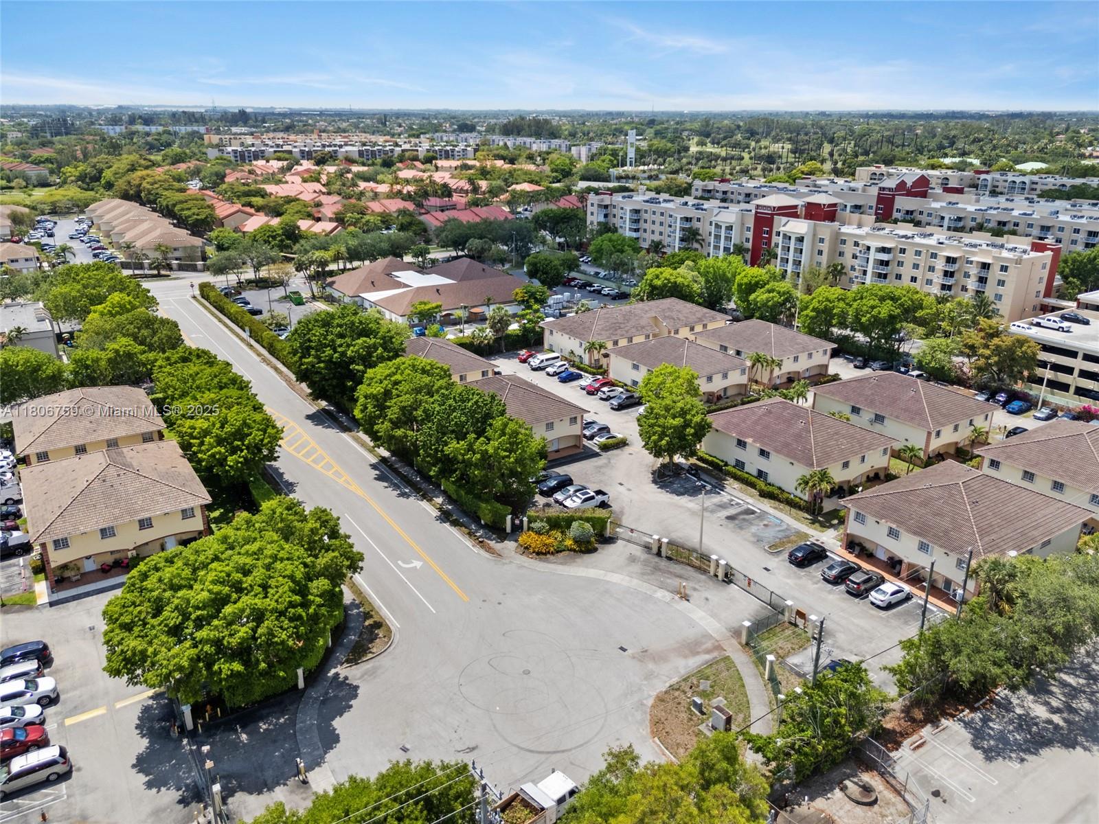 6755 Northwest 182nd Street, Unit 104 Hialeah, FL 33015 - Photo 10 of 33 an aerial view of a city