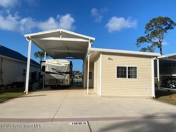 a front view of a house with a garage