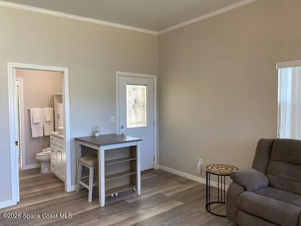 a living room with a couch and a table in it