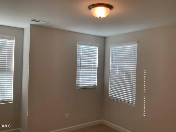 a view of a room that has a window in it