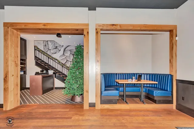 a view of a two chairs in the patio