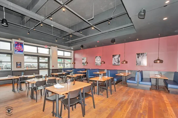 a view of a dining area with furniture window and outdoor view