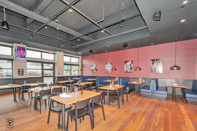 a view of a dining area with furniture window and outdoor view