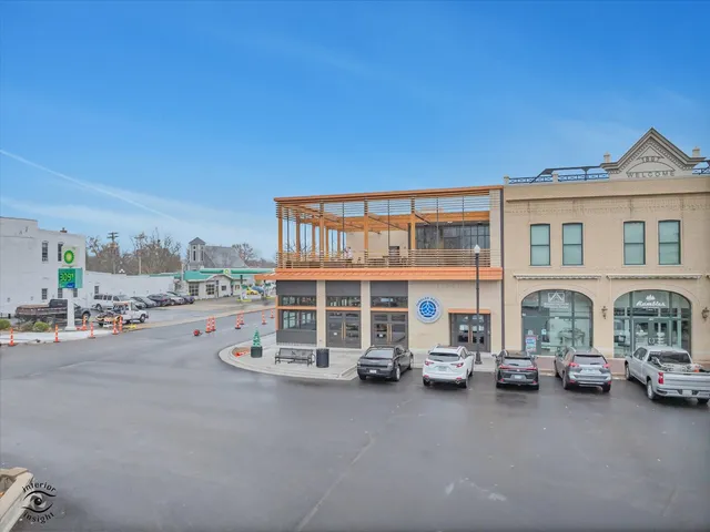 a view of a street in front of a building