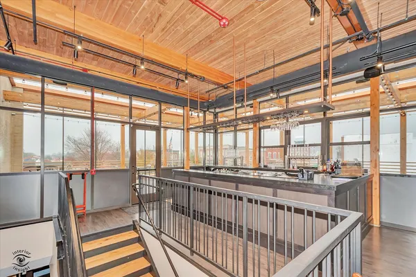 a kitchen with stainless steel appliances granite countertop a stove and cabinets