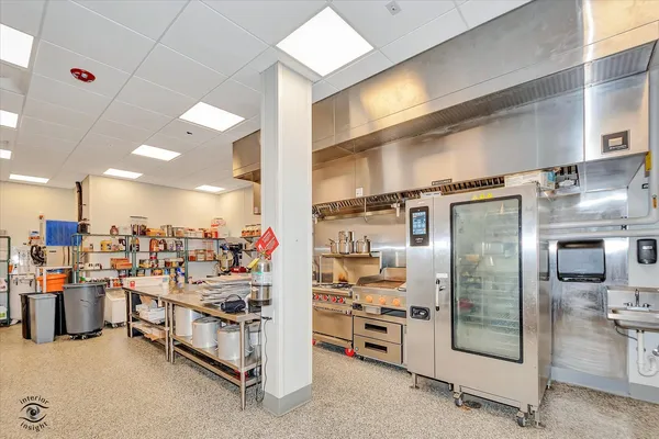 a view of a refrigerator and storage