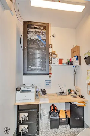 a view of a kitchen from the hallway