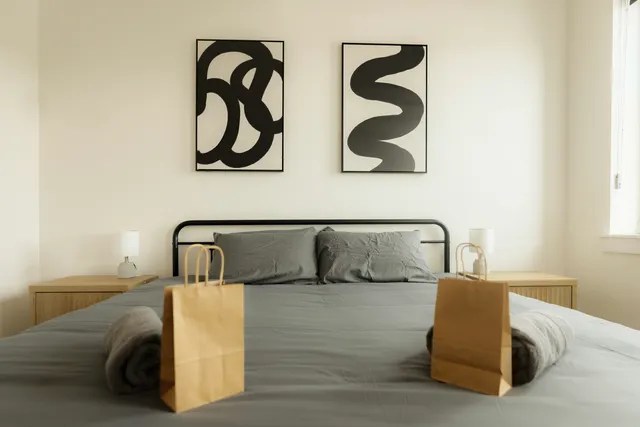 a bathroom with a sink mirror and toilet