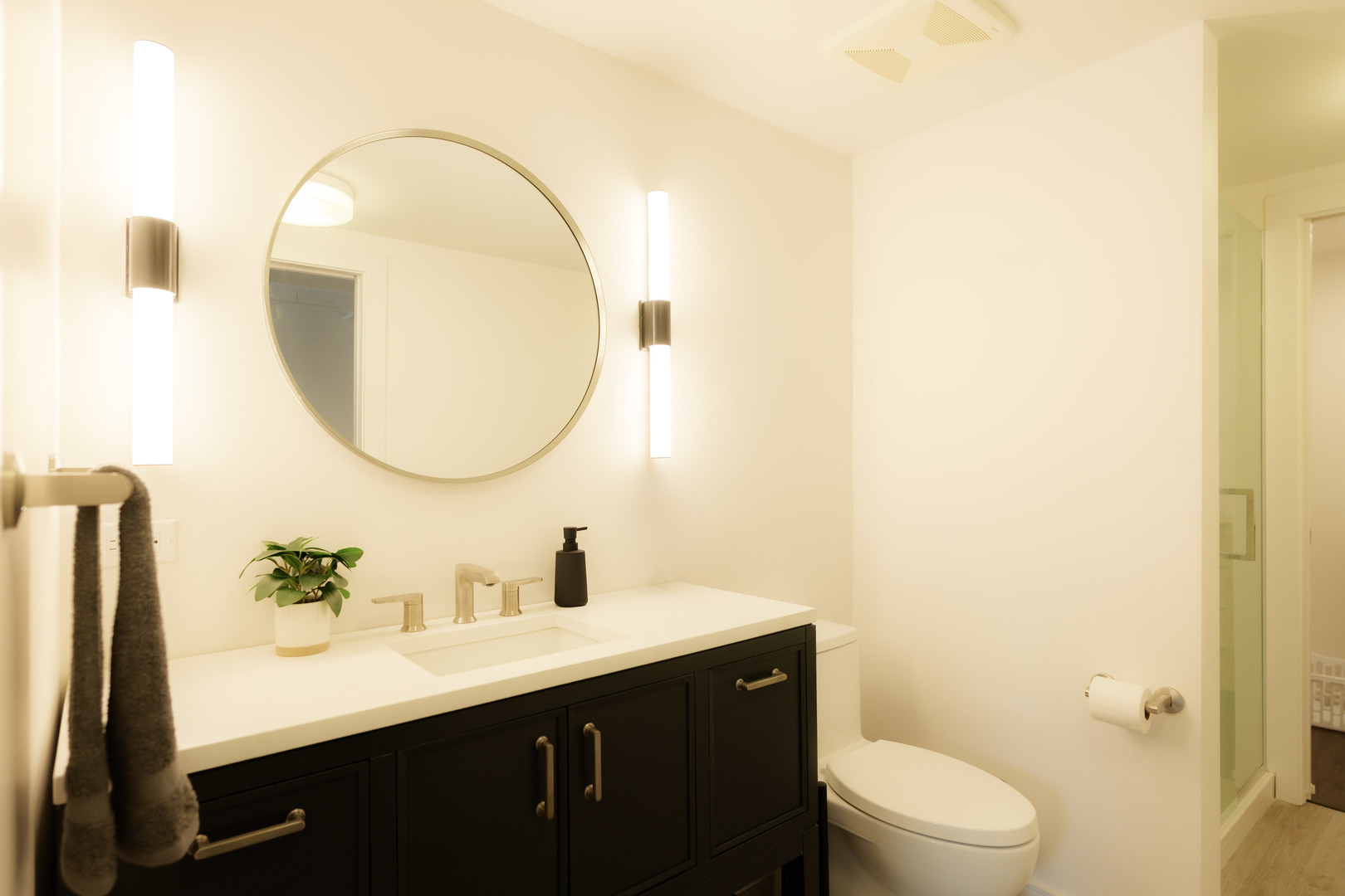 140 Washington Square Washington, IL 61571 - Photo 47 of 47 a bathroom with a sink mirror and toilet