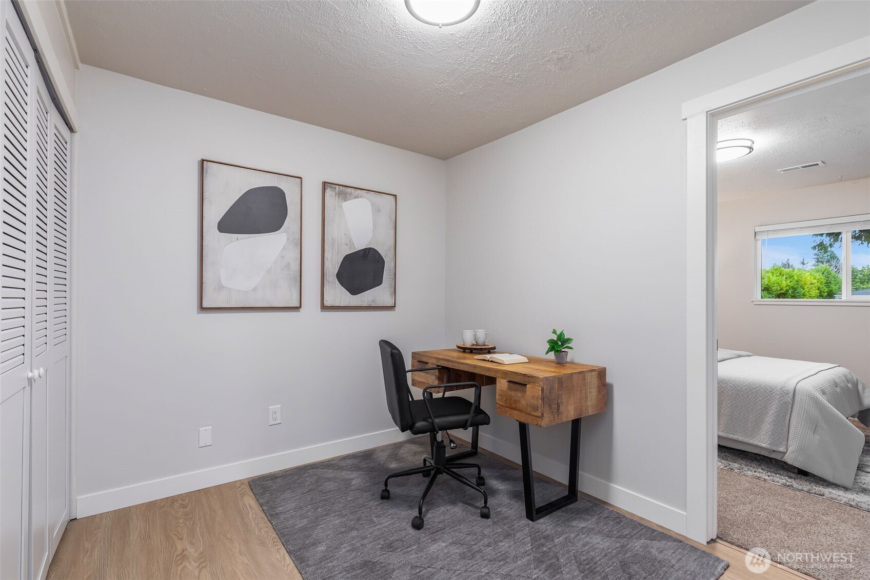 3718 Northeast 22nd Place Renton, WA 98056 - Photo 23 of 29 a workspace with furniture and mirror