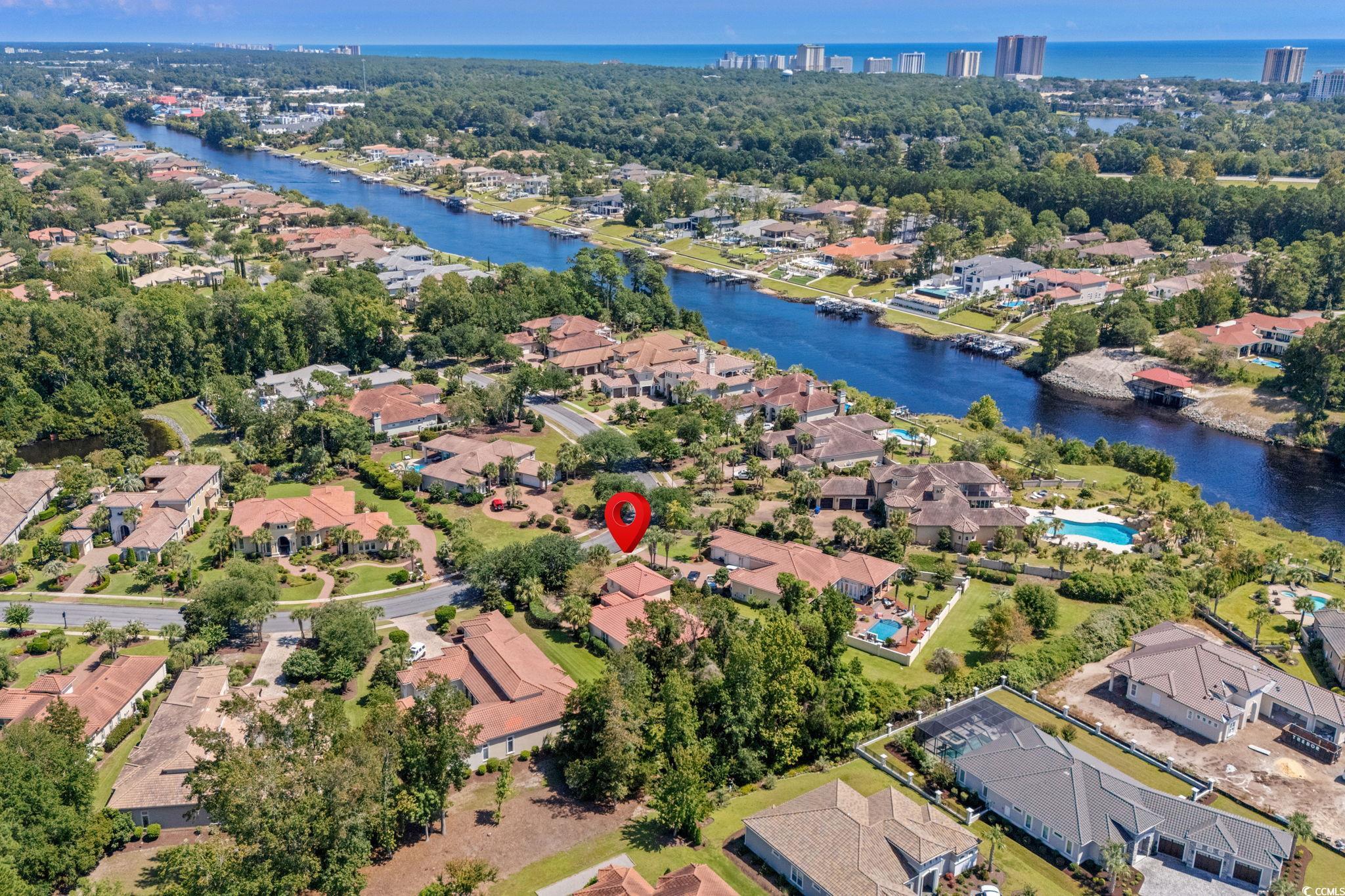 9891 Bellasera Circle Myrtle Beach, SC 29579 - Photo 32 of 40 Aerial view of residential area featuring a nearby body of water