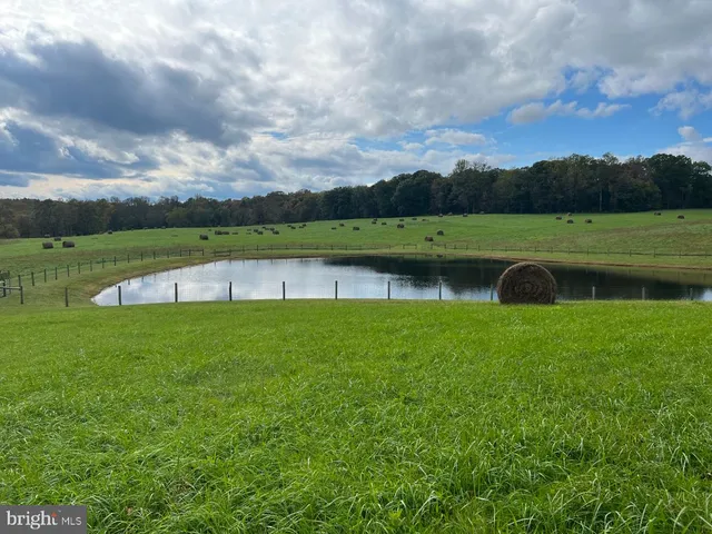 a view of a lake with a big yard