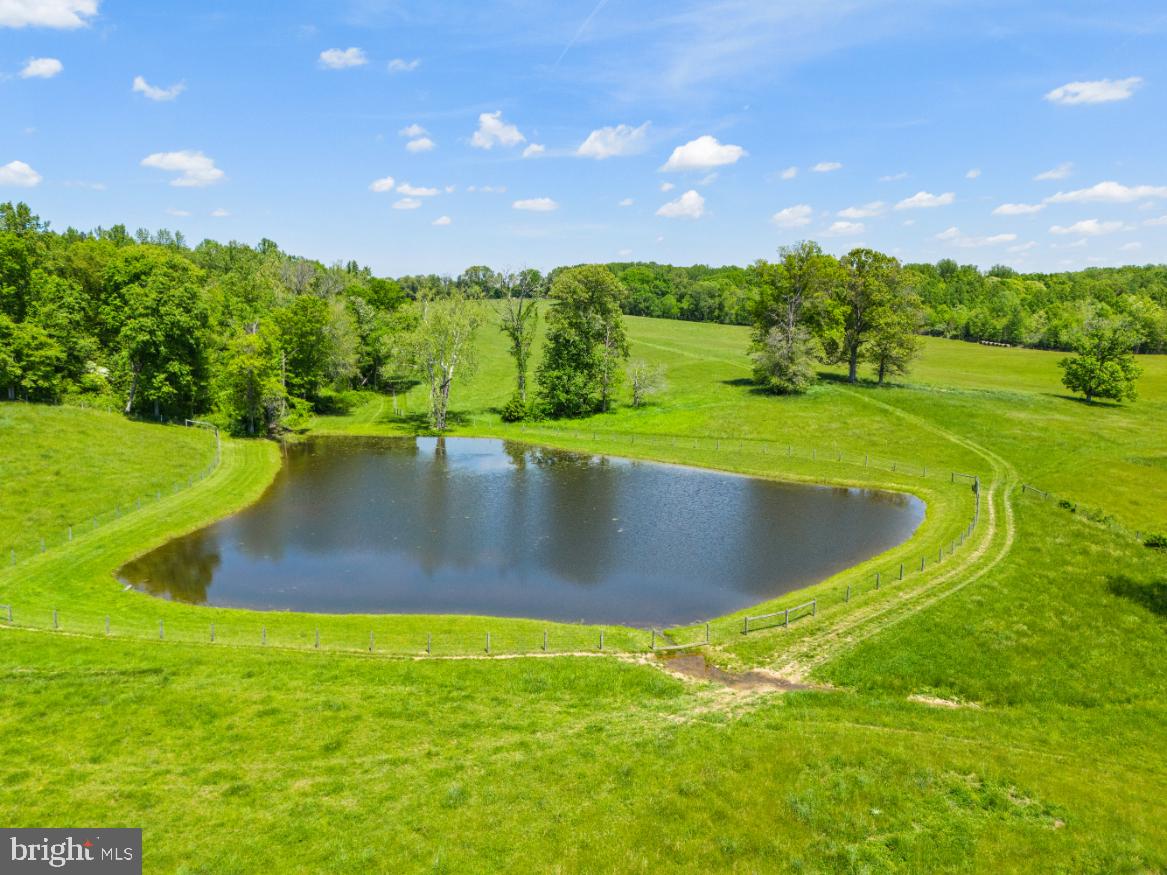 Hawthorne Farm Road Marshall, VA 20115 - Photo 3 of 15 a view of a swimming pool with a yard